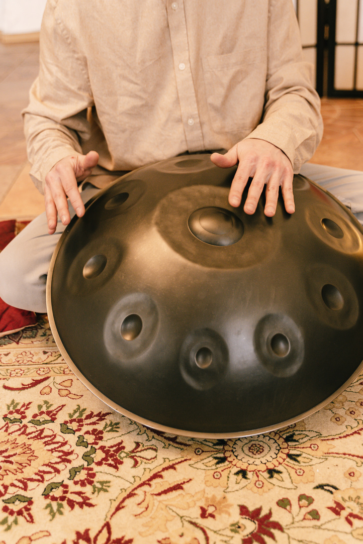 Close-Up Shot of a Person Using a Handpan